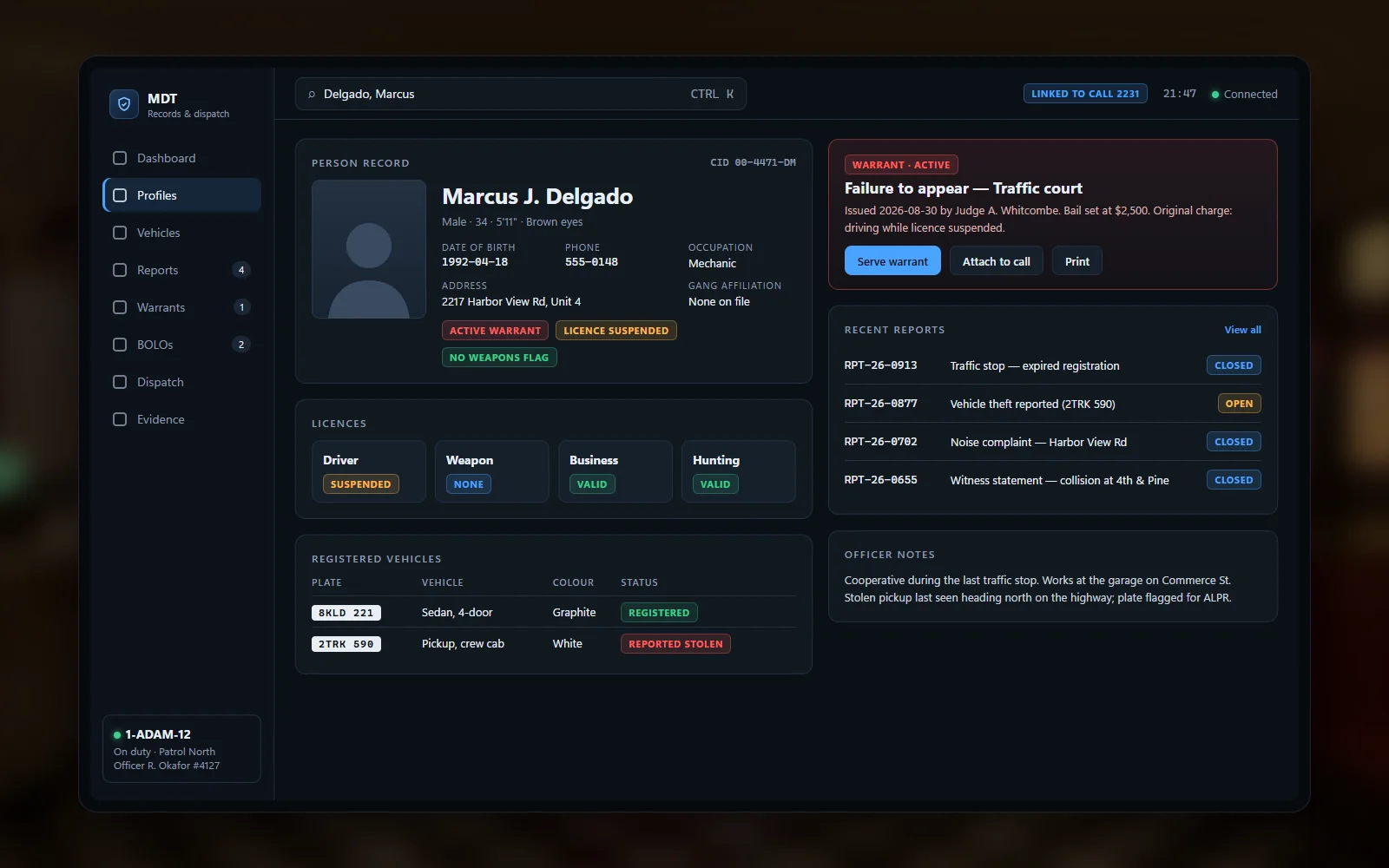 Police MDT showing a person record with licences, vehicles and warrants