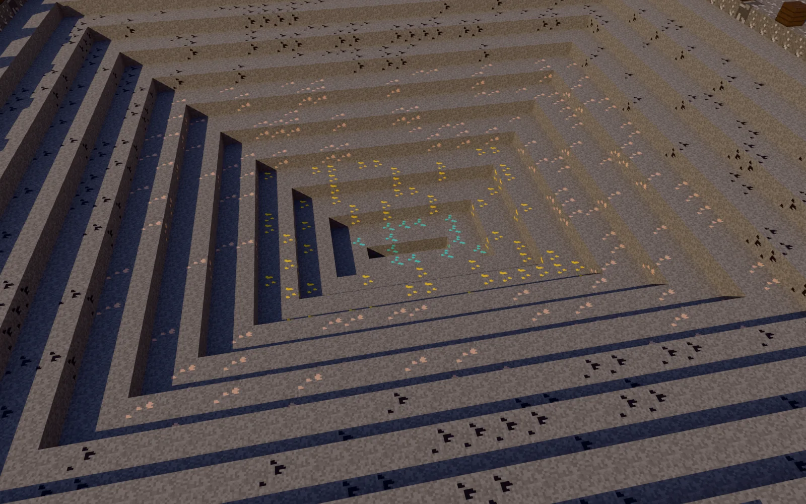 Rank mine seen from the rim, with layered ore bands and a reset sign